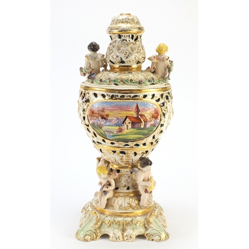 2635 - Copodimonte reticulated urn lamp base decorated with Putti, 45.5cm high