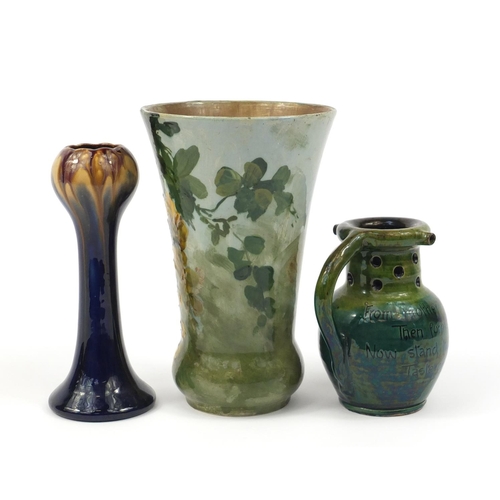 2525 - Two art pottery vases and a puzzle jug, the largest 23.5cm high