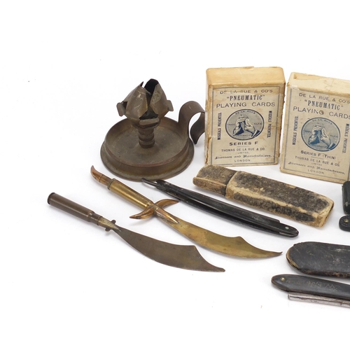 2957 - Objects including military interest trench art, letter openers, cut throat razors and playing cards