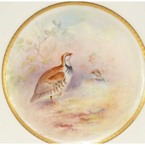 2299 - Royal Doulton plate hand painted with red-legged partridge by C Hart, 23cm in diameter