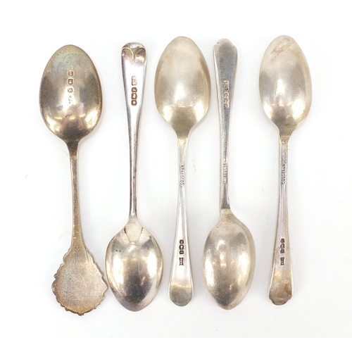 2831 - Five silver teaspoons including three of golfing interest, 73g