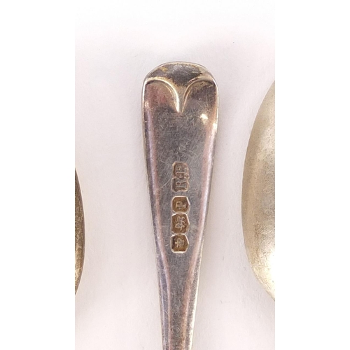 2831 - Five silver teaspoons including three of golfing interest, 73g