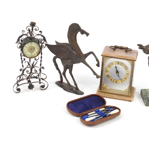 2639 - Sundry items including a Metamec mantel clock, bronzed model of Pegasus and a vanity set housed in a... 