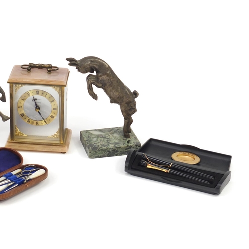 2639 - Sundry items including a Metamec mantel clock, bronzed model of Pegasus and a vanity set housed in a... 