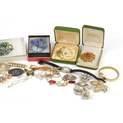 2908 - Costume jewellery including a Scottish silver citrine brooch, necklaces, and wristwatches