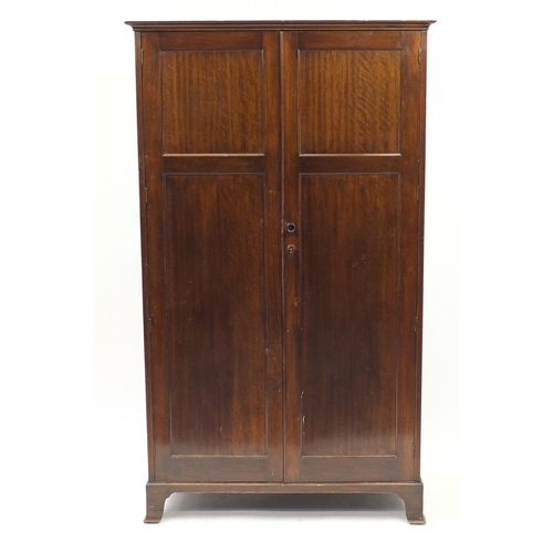 2122 - Mahogany two door wardrobe with shelf space, 184cm H x 107cm W x 53cm D