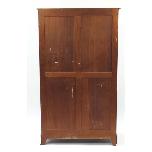 2122 - Mahogany two door wardrobe with shelf space, 184cm H x 107cm W x 53cm D
