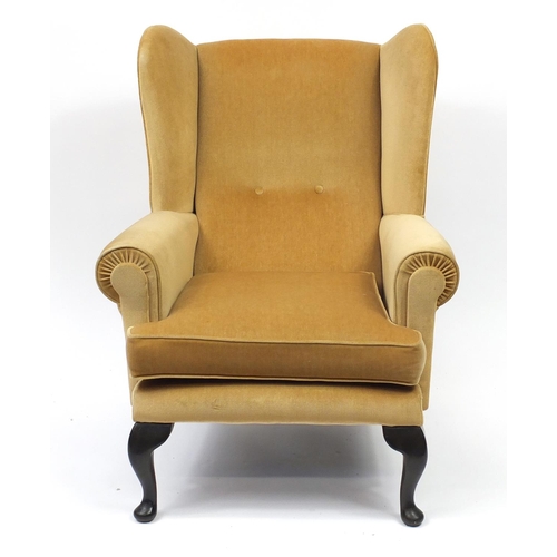 2048 - Sherwood mahogany framed wingback armchair with gold upholstery, 101cm high