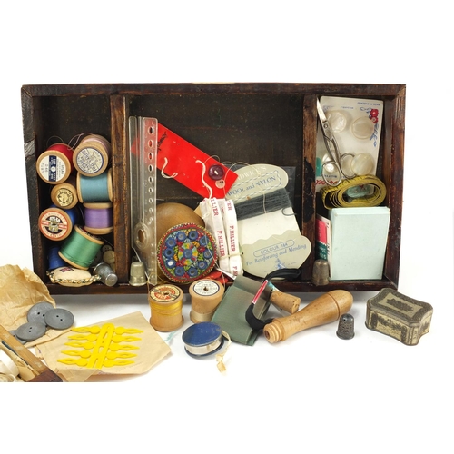 2851 - Sewing box with contents including silver thimble and cotton reels