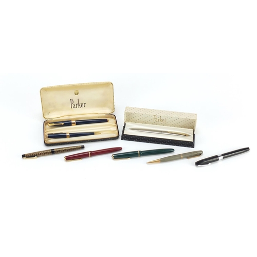 760 - Vintage and later fountain pens and propelling pencils, some with gold nibs, including Parker and Sh... 