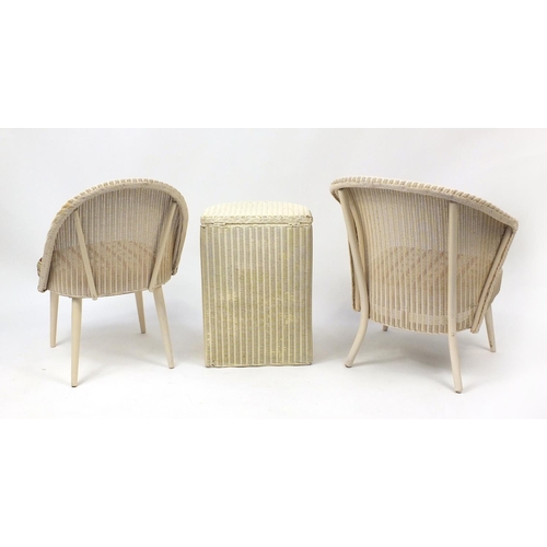 2058 - Two Lloyd Loom bedroom chairs and a laundry basket