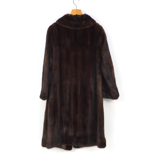 2653 - Two ladies fur coats with David Jackson labels, each 110cm in length