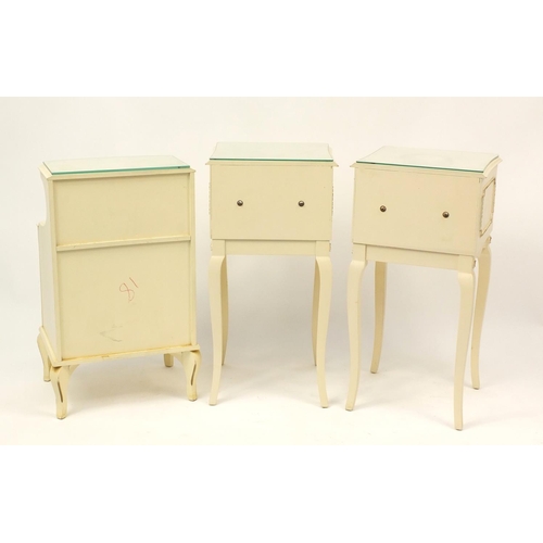 2055 - Pair of cream and gilt bedside tables and one other