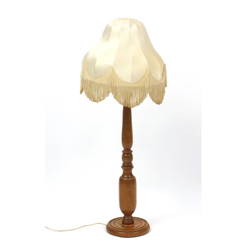 2025 - Turned oak floor standing lamp with shade, 93cm high