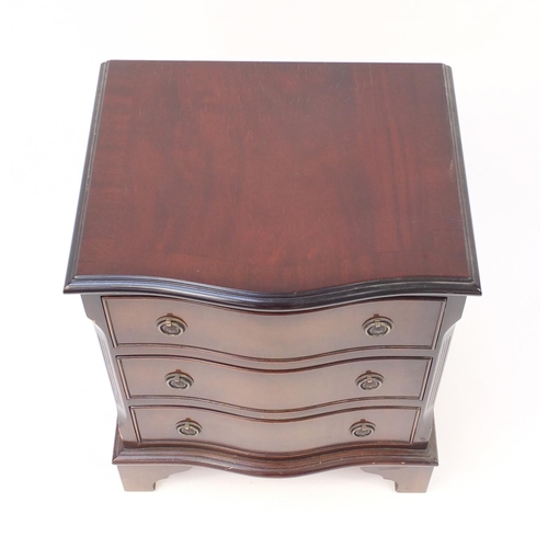 2102 - Serpentine front mahogany three drawer chest, with bracket feet, 59cm H x 48cm W x 40cm D