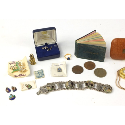 2955 - Objects including antique and later British coins, silver and enamel charms, silver earrings and aut... 