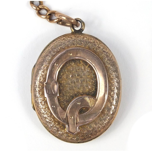 153 - Unmarked gold graduated chain (tests as 9ct gold) and a Victorian gold plated locket, the chain 18.0... 