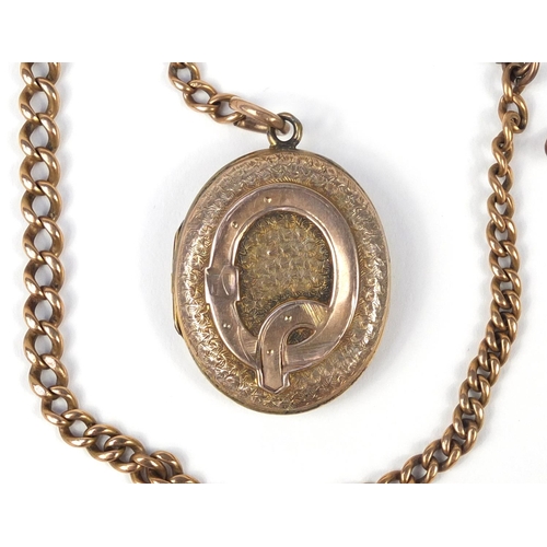 153 - Unmarked gold graduated chain (tests as 9ct gold) and a Victorian gold plated locket, the chain 18.0... 