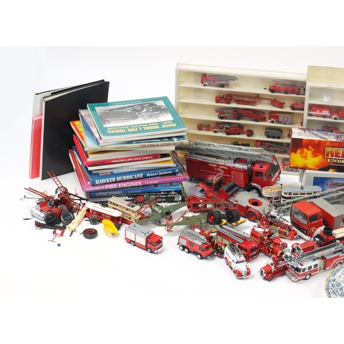 2460 - Large collection of fire fighting memorabilia including die cast vehicles, hardback books and a penc... 