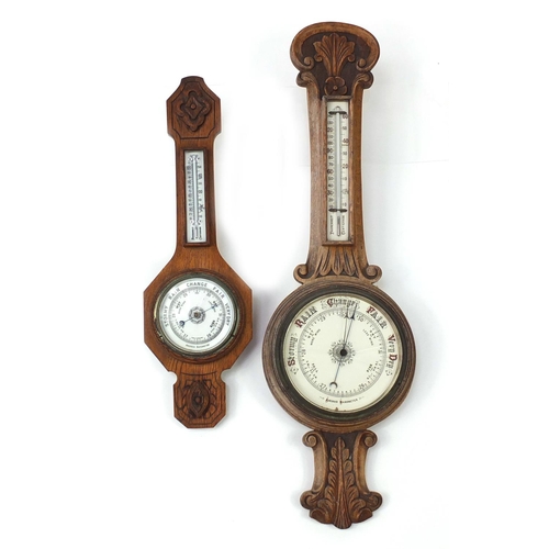 2124 - Two oak aneroid wall barometers with thermometers, the largest 89cm high