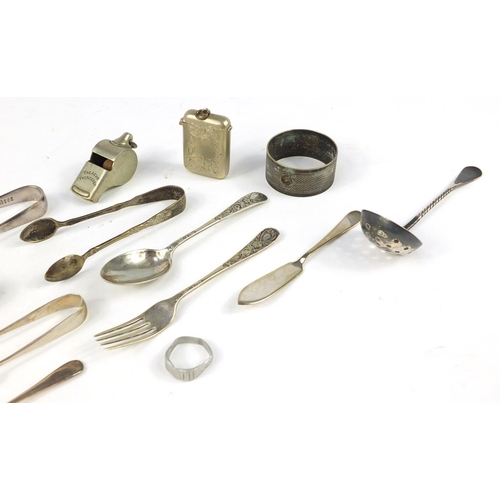 2954 - Objects including a pair of silver plated sugar tongs,  vesta and Acme Thunderer whistle