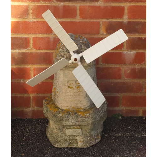 2148 - Stoneware garden model of a windmill, 60cm high