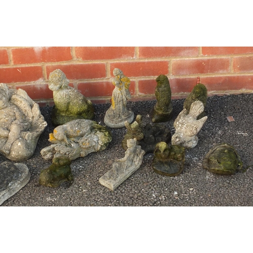 2153 - Group of stoneware garden figures and animals, the largest 29cm high