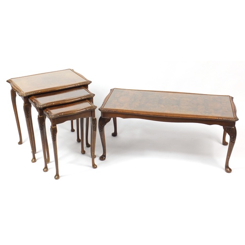 2114 - Nest of three walnut occasional tables with glass tops and matching coffee table