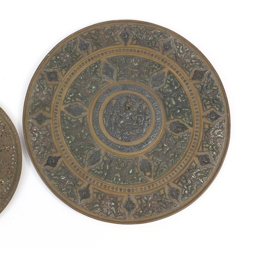 2858 - Two Indian brass trays profusely decorated with figures and foliage, the largest 45cm x 45cm