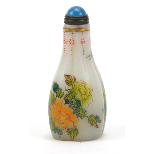 2973 - Chinese glass snuff bottle hand painted with flowers, 9cm high