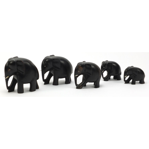 3002 - Graduated set of five carved ebony elephants, the largest 10.5cm high