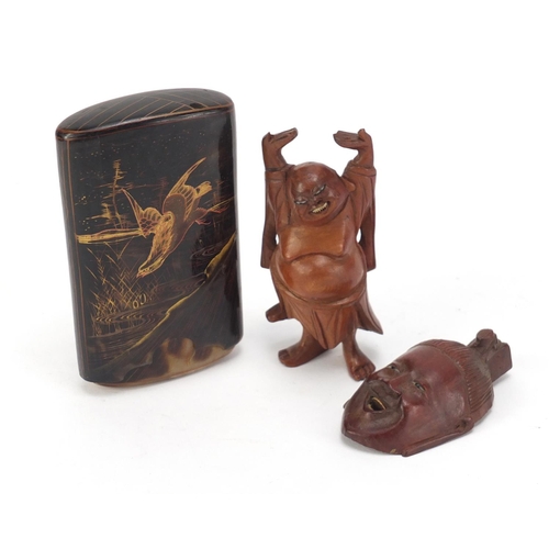 3008 - Japanese faux tortoiseshell cigar box, Chinese carved wood figure of Buddha and a mask, the largest ... 