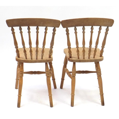 2043 - Pair of pine spindle back chairs, 87cm high