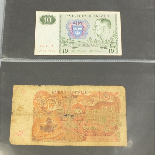 2698 - Album of world banknotes including China