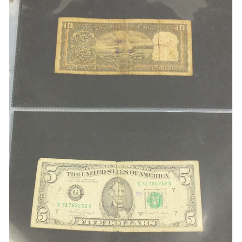 2698 - Album of world banknotes including China