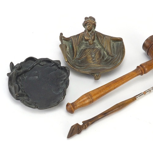 2811 - Objects comprising two ashtrays and Treen deer foot design dip pen, the largest 22.5cm in length