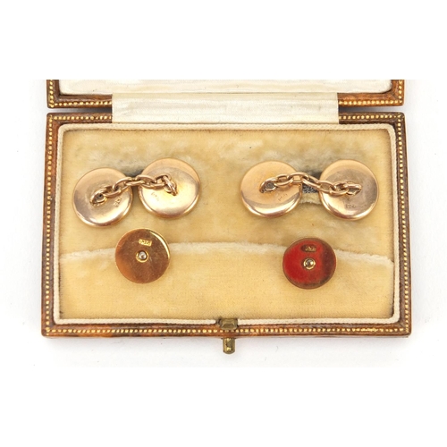 43 - 9ct gold and mother of pearl gentlemen's dress stud and cufflink set, housed in a Finnigans Ltd fitt... 