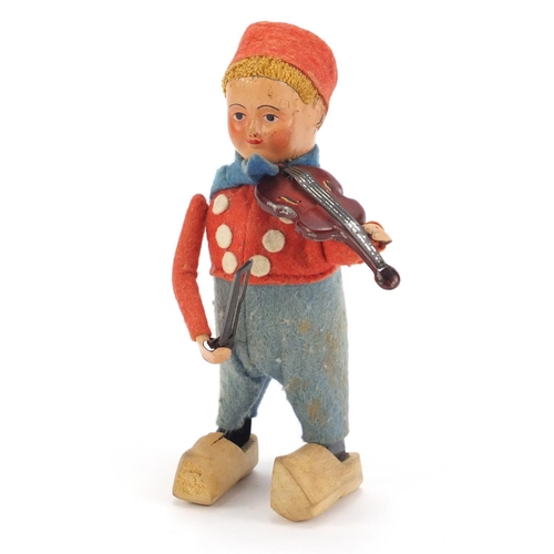 94 - Vintage Schuco tinplate clockwork Dutch boy playing a violin, 16cm high