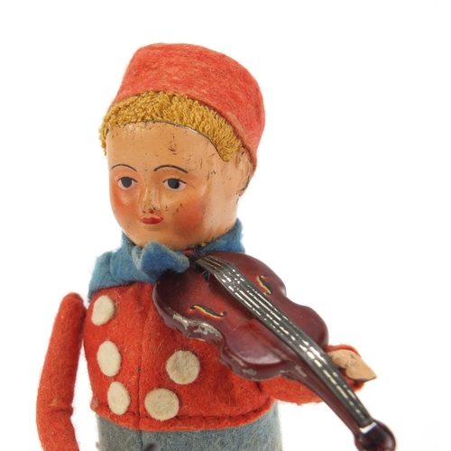 94 - Vintage Schuco tinplate clockwork Dutch boy playing a violin, 16cm high