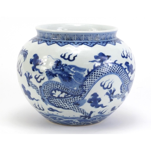 74 - Chinese blue and white porcelain jar, hand painted with two dragons amongst clouds within ruyi borde... 