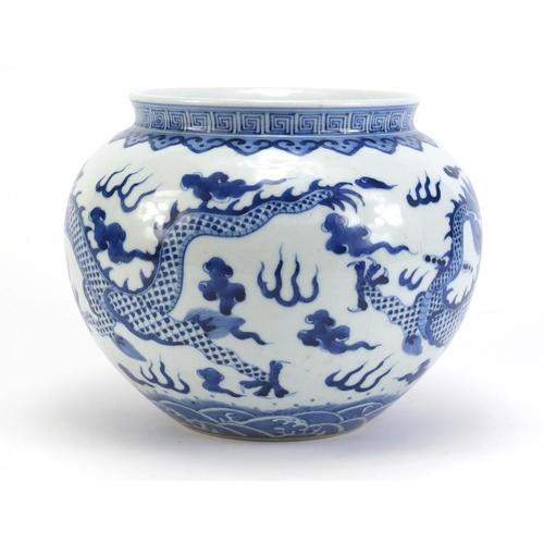 74 - Chinese blue and white porcelain jar, hand painted with two dragons amongst clouds within ruyi borde... 