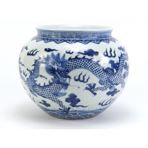 74 - Chinese blue and white porcelain jar, hand painted with two dragons amongst clouds within ruyi borde... 