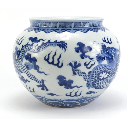 74 - Chinese blue and white porcelain jar, hand painted with two dragons amongst clouds within ruyi borde... 