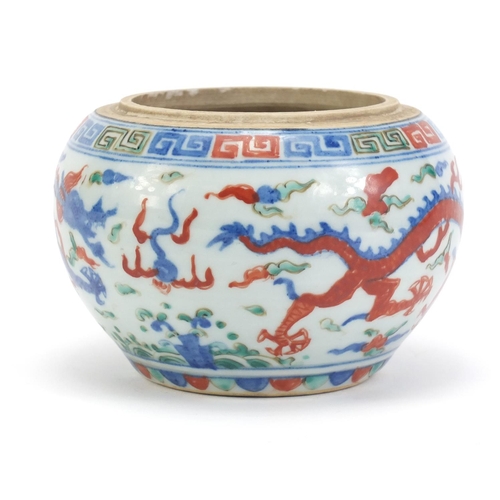 77 - Chinese porcelain wucai pot, hand painted with dragons amongst clouds chasing flaming pearl, six fig... 