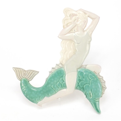 62 - Poole Art Deco pottery wall plaque of a female on dolphin by Phoebe Stabler, 22cm high