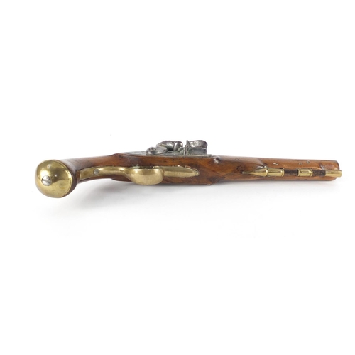 57 - Pair of George III walnut flintlock holster pistols by Thomas Ketland & Co, the brass barrels stampe... 