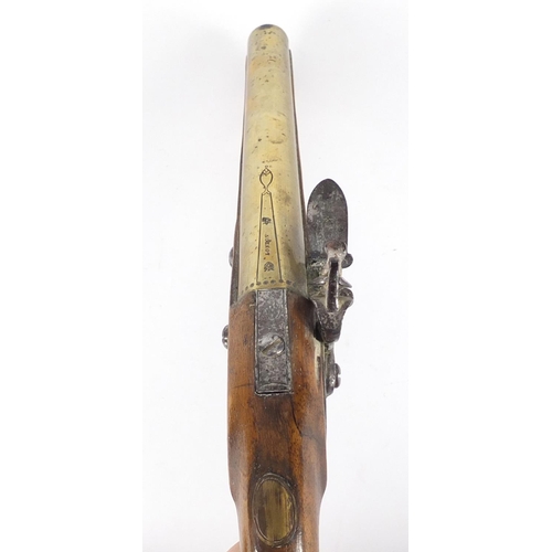 57 - Pair of George III walnut flintlock holster pistols by Thomas Ketland & Co, the brass barrels stampe... 