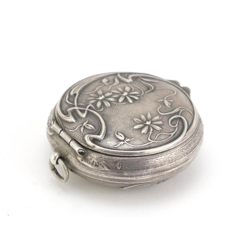 105 - Art Nouveau unmarked silver compact embossed with stylised flowers, 4.8cm in diameter, 17.5g