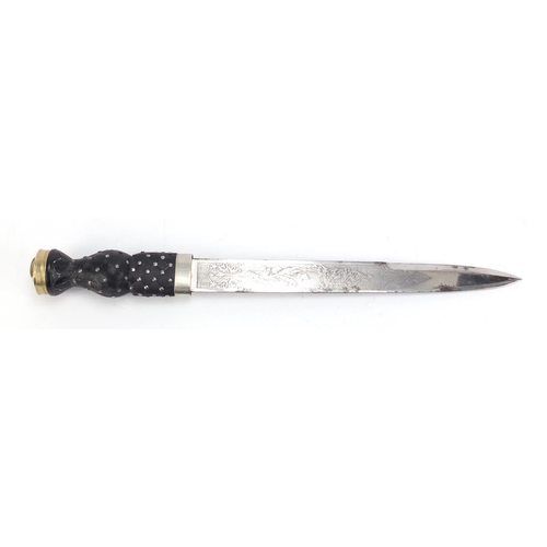 146 - Scottish military style Highlander's dirk with scabbard, 44.5cm in length