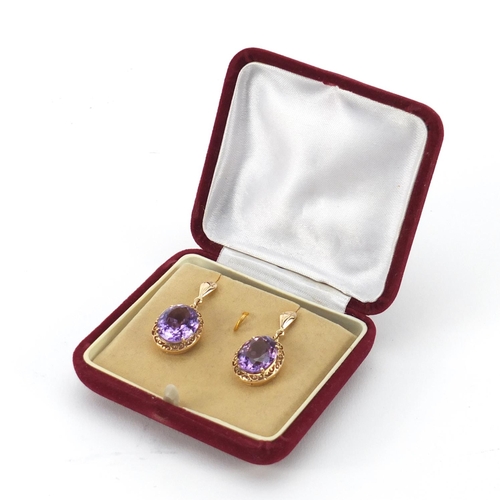 41 - Pair of unmarked gold amethyst earrings, 3.2cm in length, 8.4g